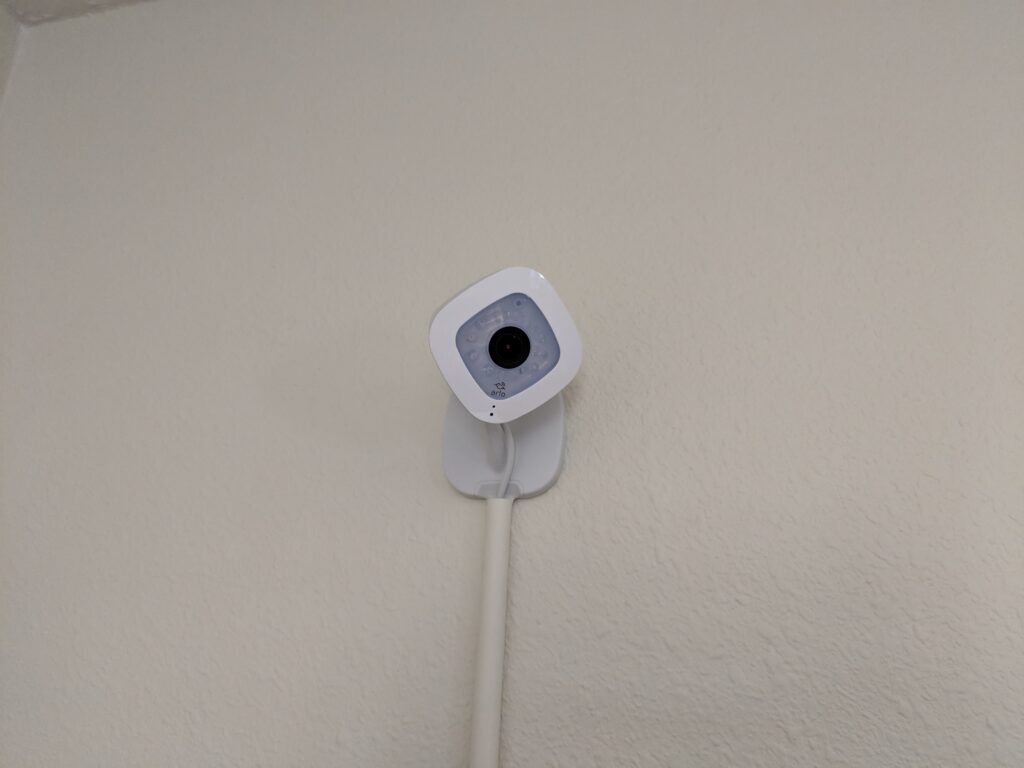 Arlo Q mounted to wall