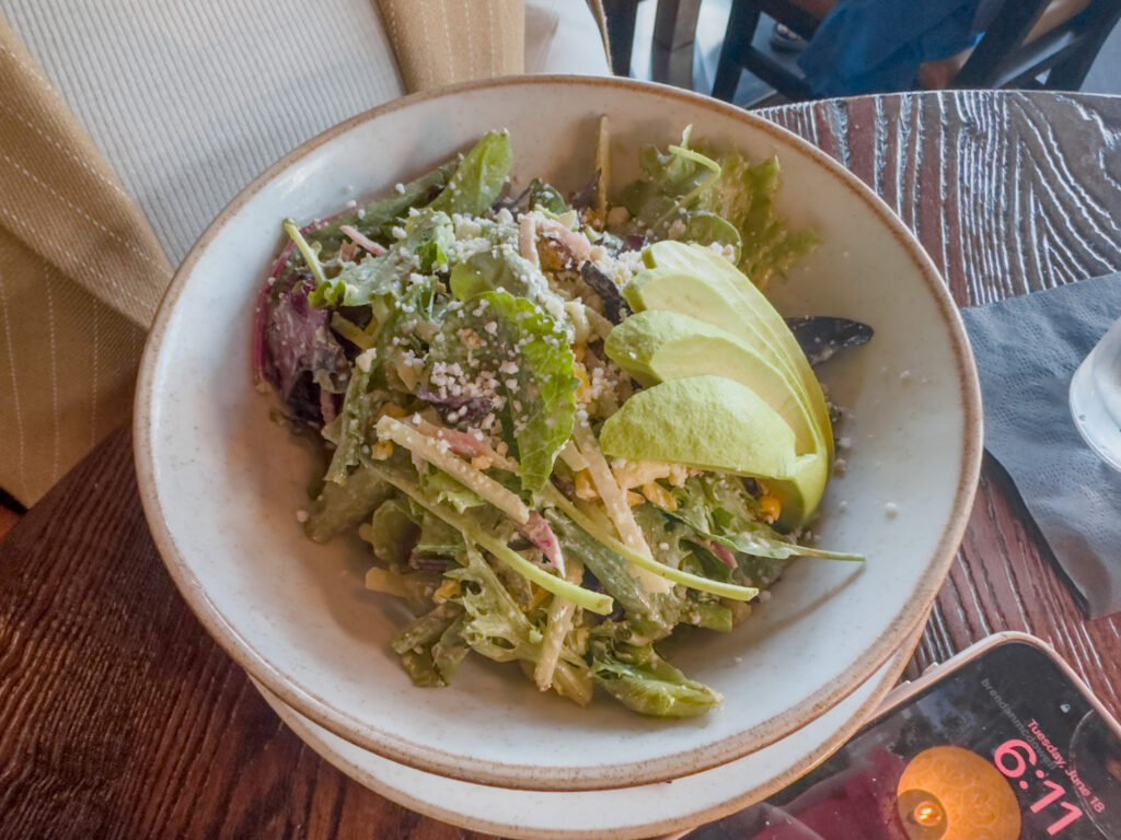 Kolucan Mexican Bar & Grill - Ensalada de la Casa at Kolucan Sarasota, mixed greens with fanned avocado, queso fresco, corn, jicama and radish