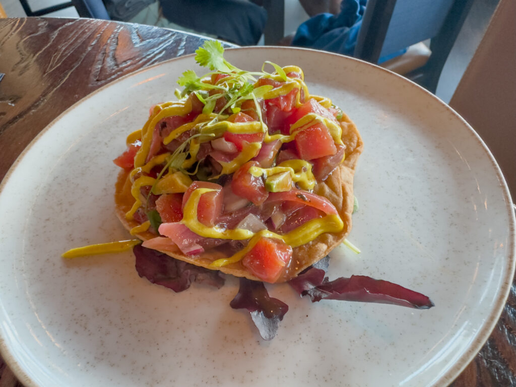 Kolucan Mexican Bar & Grill - Tostada Veracruzana at Kolucan Sarasota, a crispy tostada piled with diced yellowfin tuna, avocado and habanero aioli