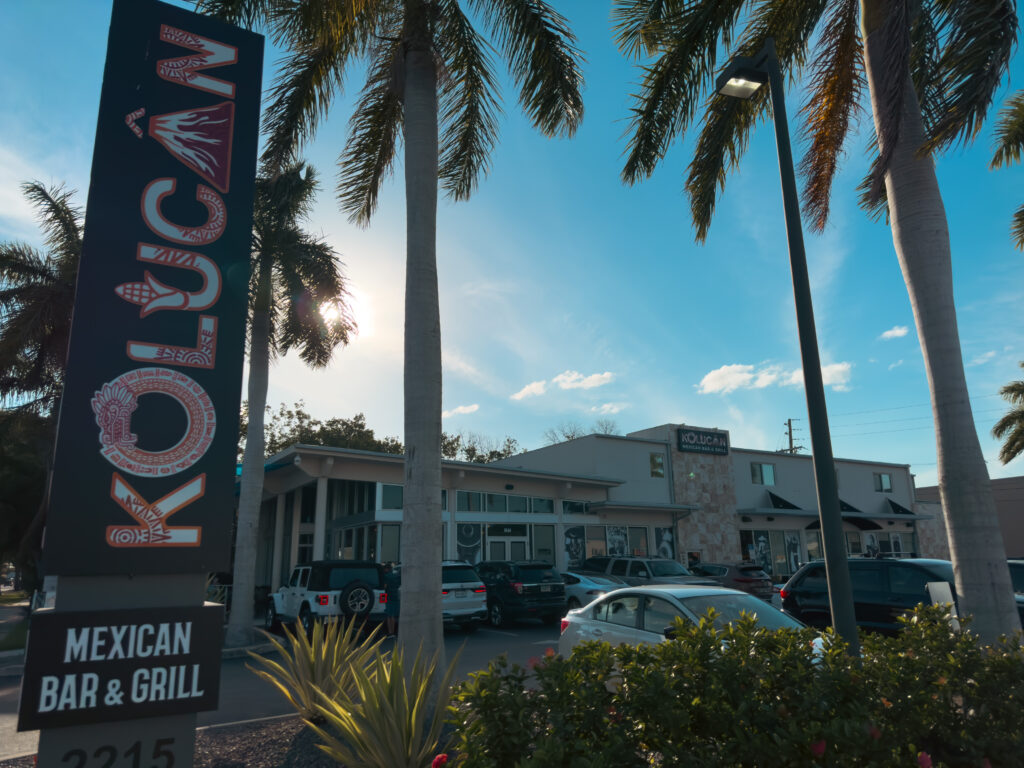 Kolucan Mexican Bar & Grill - Exterior of Kolucan Mexican Bar & Grill in Sarasota's Gulf Gate with palm trees and the Kolucan sign